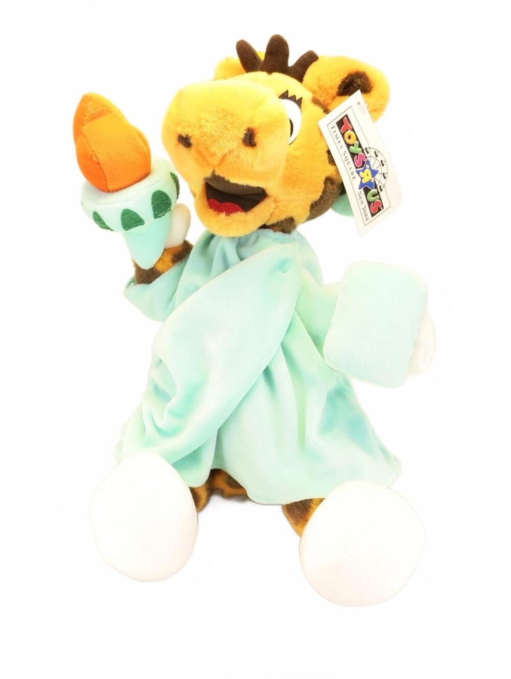 Vintage Toys "R" Us Geoffrey Giraffe Statue in Times Square Statue of Liberty